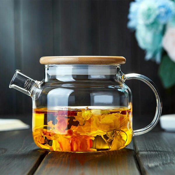 glass teapot with wooden lid